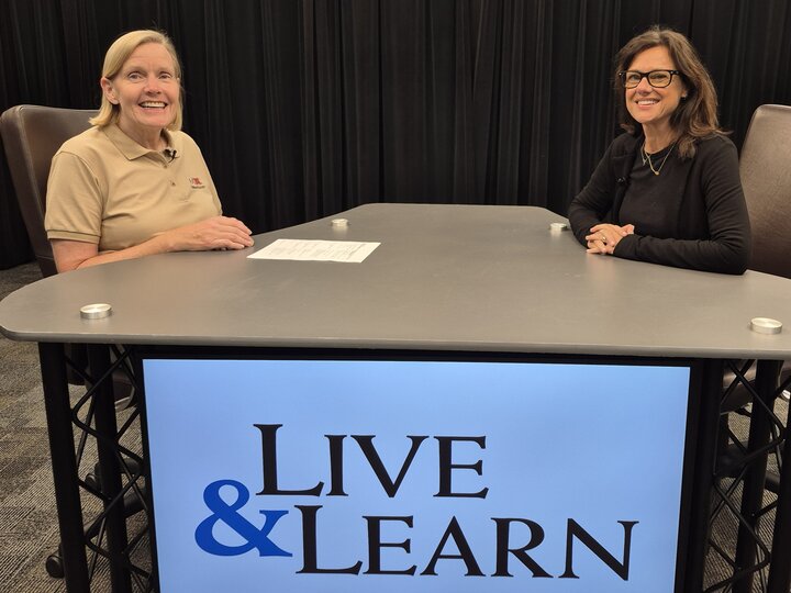 Dr. Masters and Dr. Harvey at the Live & Learn table