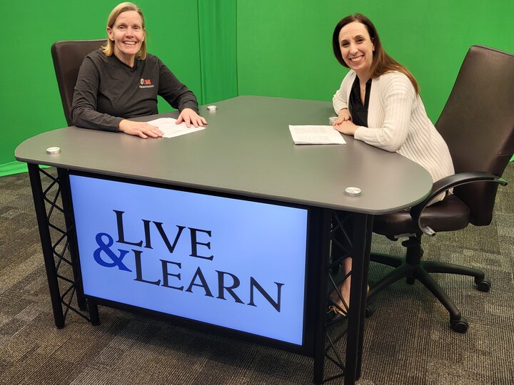 Julie Masters and Dr. Lindsay Wilkinson at the Live & Learn desk