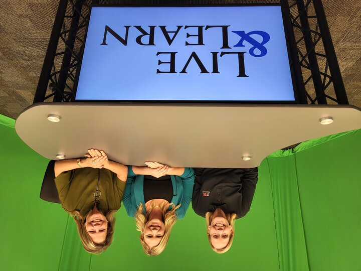Julie Masters, Dr. Lakelyn Hogan Eichenberger, and Dr. Sarah Teten Kanter and the Live & Learn desk