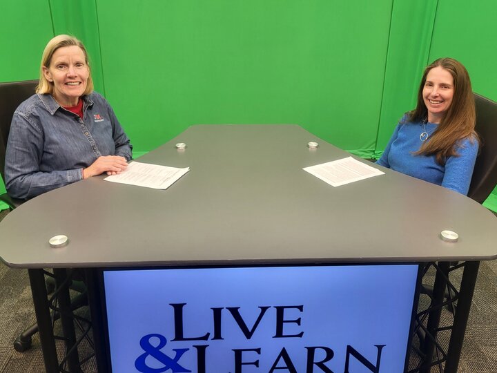 Julie Masters and Elizabeth Harlow, MD at the Live & Learn desk
