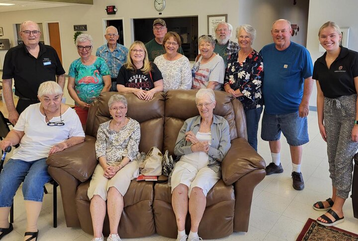 Group of older adults with a gerontology student